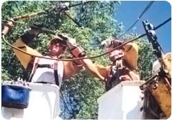Lineman working on power lines 