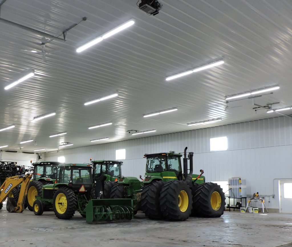 Tractors lined up in garage