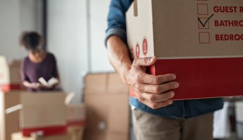 People packing moving boxes